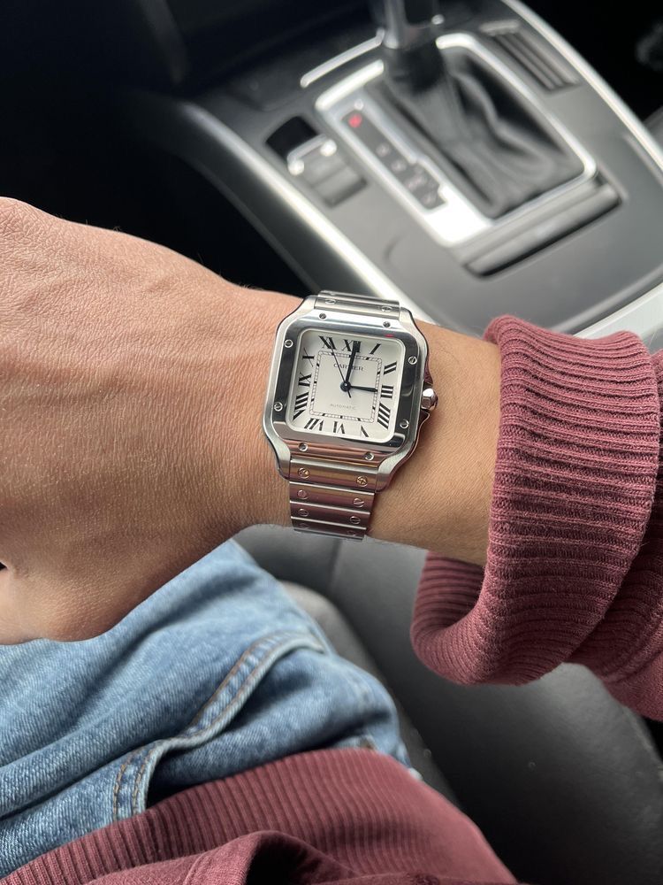 Stainless steel square watch on wrist