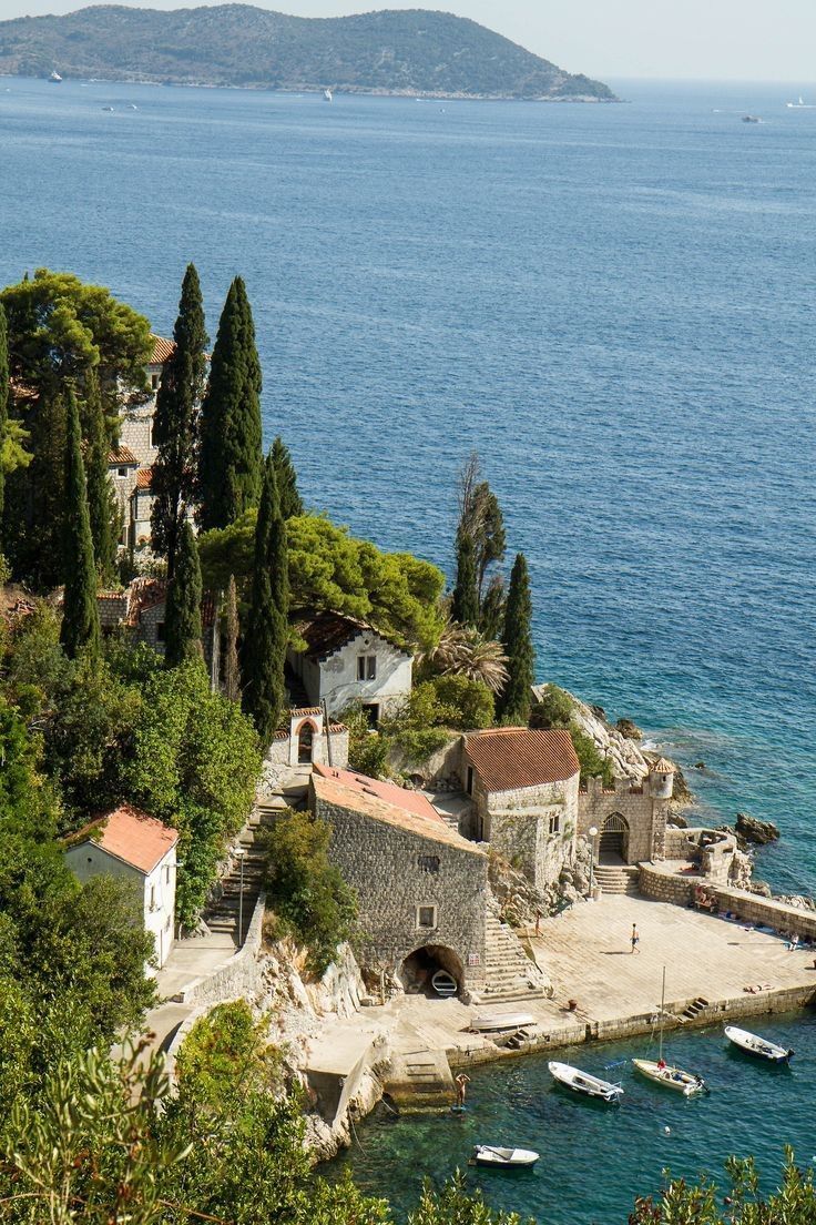 Coastal village beside clear water