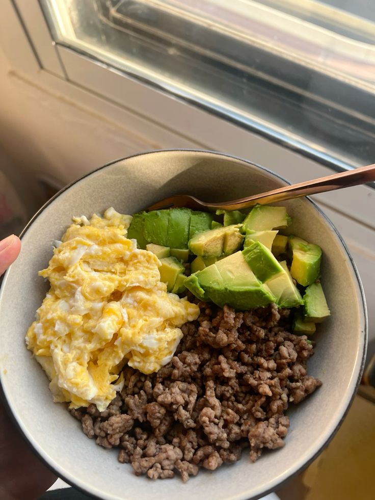 Bowl with eggs, avocado, and ground beef